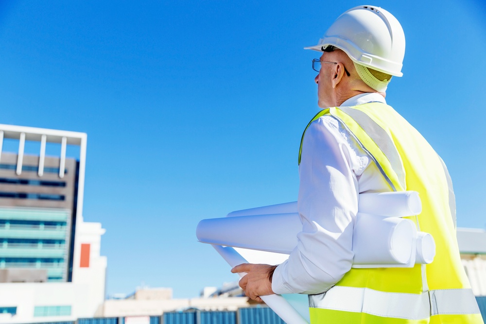 Engineer builder at construction site - shutter stock limited licence