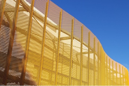 Signal yellow façade points the way to Maple expertise